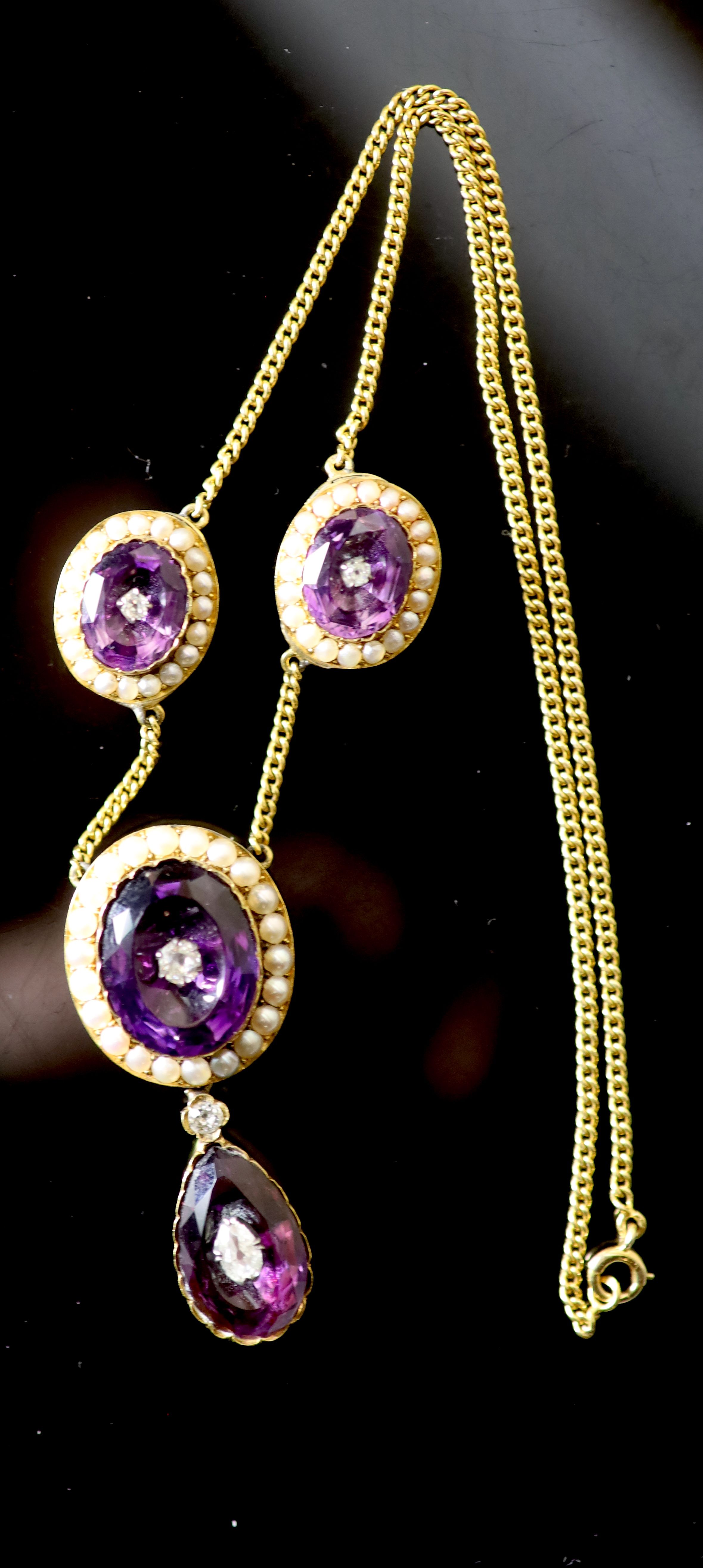 A Victorian style gold, amethyst, split pearl and old cut diamond cluster set drop necklace,